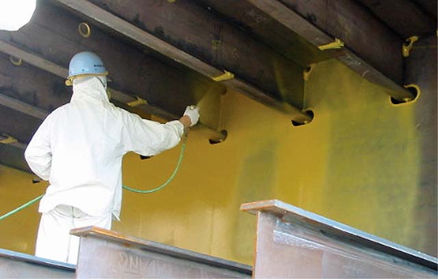 Applying coating to tank